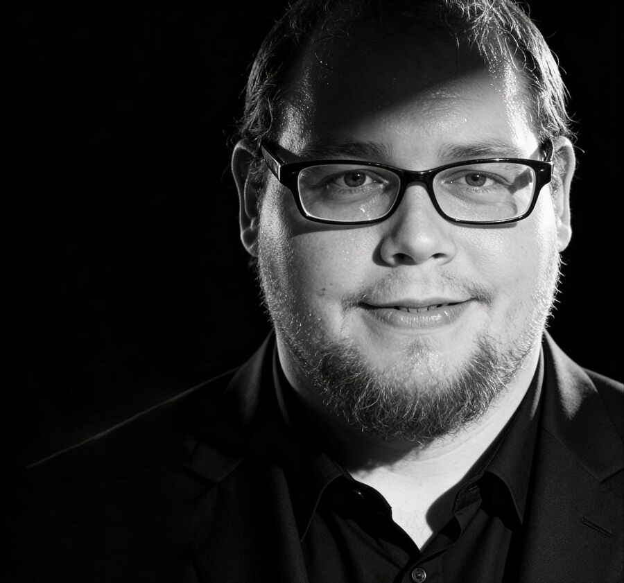 Headshot of Nicolas Comstock.